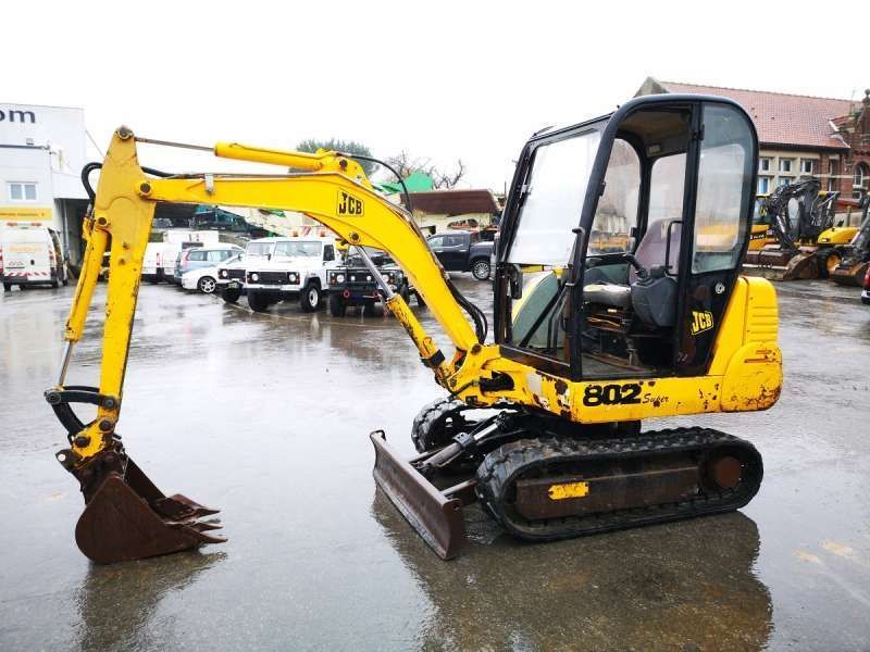 Нижнє скло дверей JCB 802 Super 802.7 803 Plus 803, 804, 8052, 8060 3132 фото